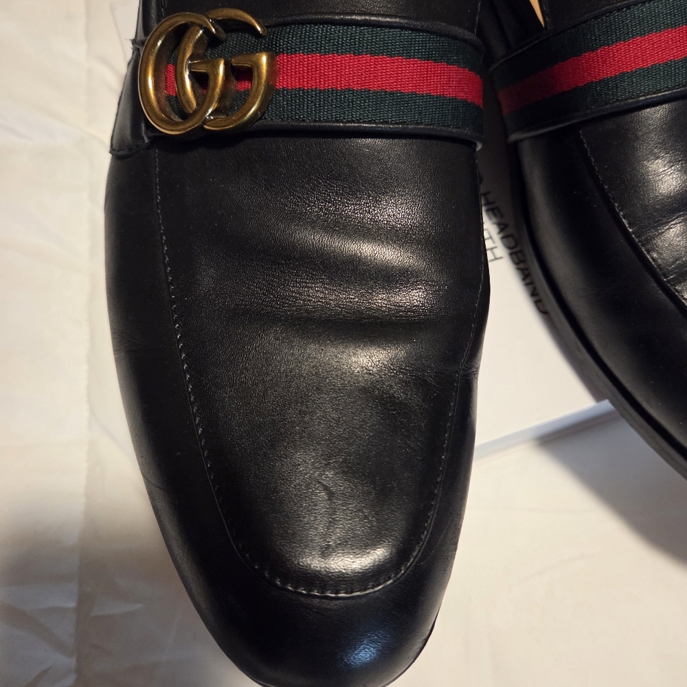 Black Leather Loafers with Gold Accent